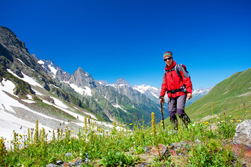 Hiker in Caucasus mountains