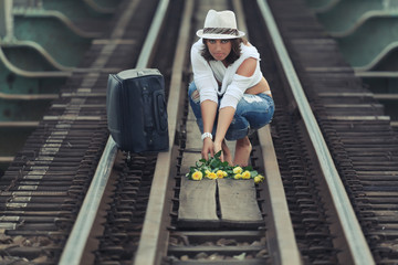 Woman on train track