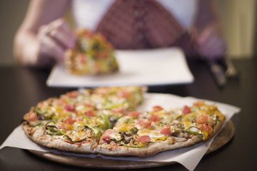 Woman Eating Pizza, Front View