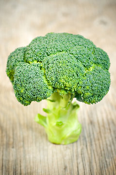 Broccoli on wooden surface