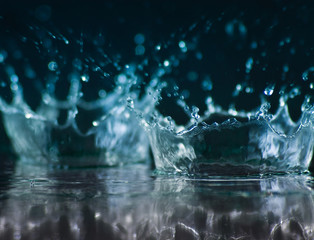 Liquid Splash Crown with Reflection Background