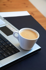 Fototapeta na wymiar coffee and laptop