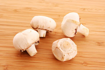 Mushroom on wooden background