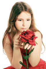 Beautiful child girl with red rose.