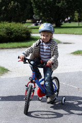 4 years old boy riding bike