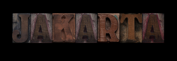 the word Jakarta in old letterpress wood type