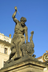 Fototapeta na wymiar Battling Titan at the Gate of Hradcany Castle in Prague, Czech R