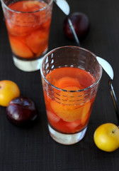 Vitaminized plum drink and plums