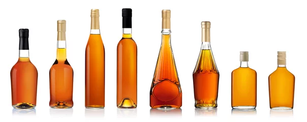 Gordijnen Set van cognac flessen geïsoleerd op een witte achtergrond © Gresei