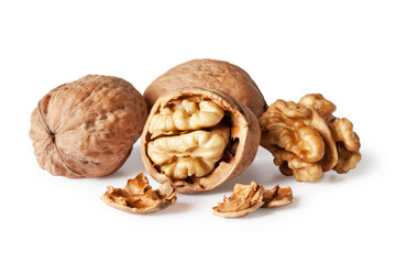 walnut and a cracked walnut isolated on the white background