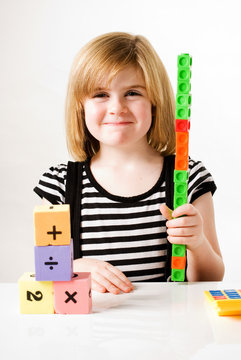 girl with stacking blocks