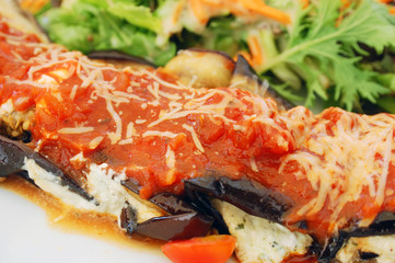 baked eggplant filled with tomato and cheese