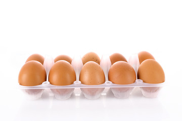 Many eggs isolated on white