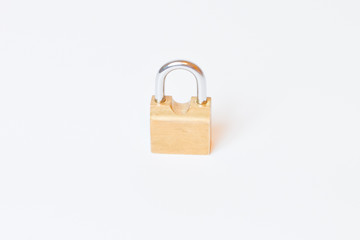 yellow iron lock on a white background