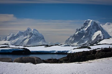 Foto auf Glas snow-capped mountains © Goinyk