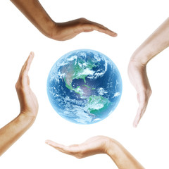 Earth with multiracial human hands. on white background.