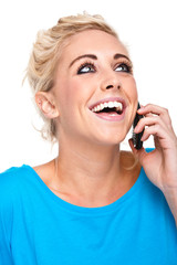 attractive Woman Laughing and Talking on Mobile Phone