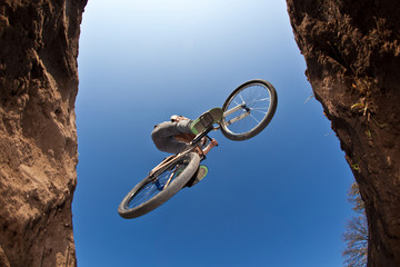 boy going airborne with a dirt  bike