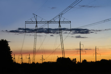 Fototapeta na wymiar The high voltage transmission towers