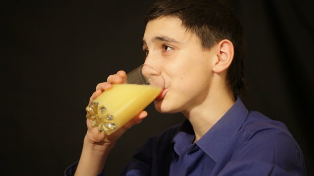boy drinks juice
