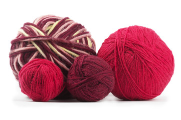 Four colored wool clews