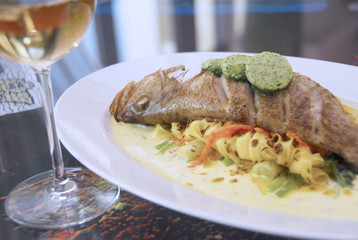 Hamour with glass of champagne