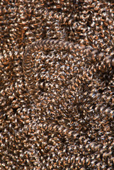An abstract background of copper-colored metal shavings (swarf)