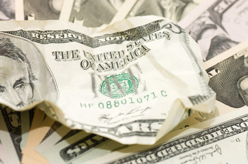 The crumpled banknote on new dollars