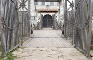 Input and suspension bridge in old castle