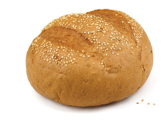 Fresh baked sesame bun isolated on white