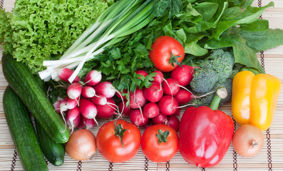 mix of fresh vegetables on wooden table