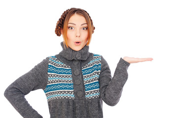 pretty surprised woman holding something