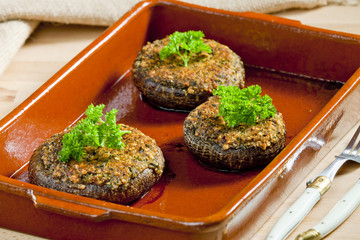 baked champignons filled with peanuts mixture