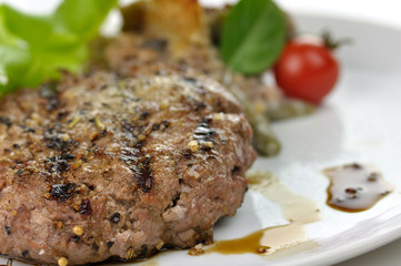grilled hamburger on a plate