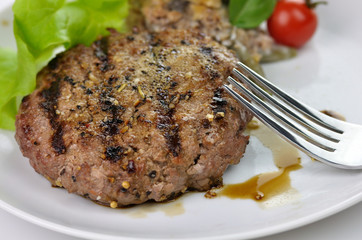 grilled hamburger on a plate