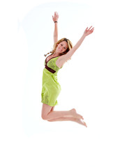 Beautiful 20s girl jumping, isolated