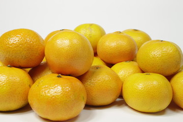 Fresh tangerine on white background