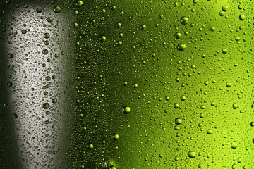 Texture of water drops on the bottle of beer.