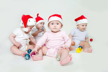 group of santa babies over white