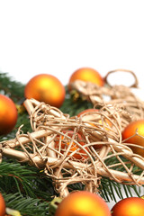 Arrangement with orange Christmas ornaments and gold stars