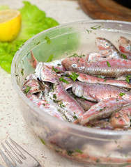 Preparation of baked fish with sauce