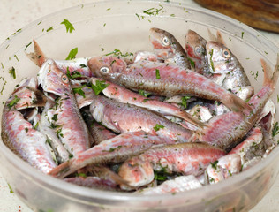 Preparation of baked fish with sauce