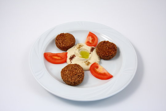 spicchi di pomodoro con polpette impanate