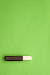 Chalk isolated on green