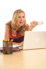 Excited businesswoman working