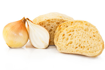 Sliced and half of loaf fresh wheat bread with onion on white. S
