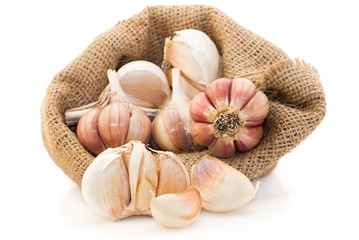 Food ingredient: Macro of garlic in canvas sack. Sdof