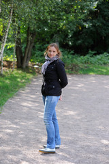 Fototapeta premium Young woman in the park