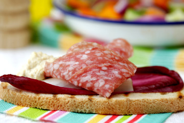 Milano Salami on Bruschetta with Houmous