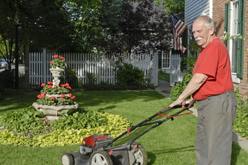 Senior Citizen Mowing Lawn